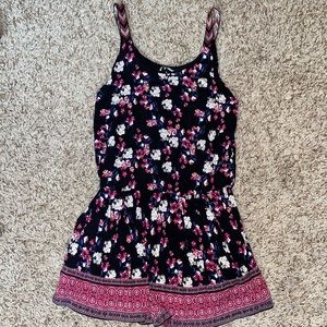 black romper with flowers